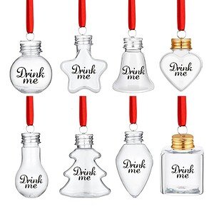 Miniature glass bottles with "Drink me" text, featuring various shapes and red ribbons for Christmas.