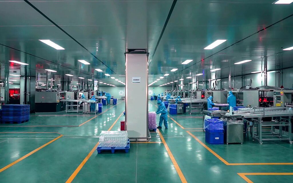 Manufacturing facility for custom glass and plastic containers with advanced machinery and quality c.