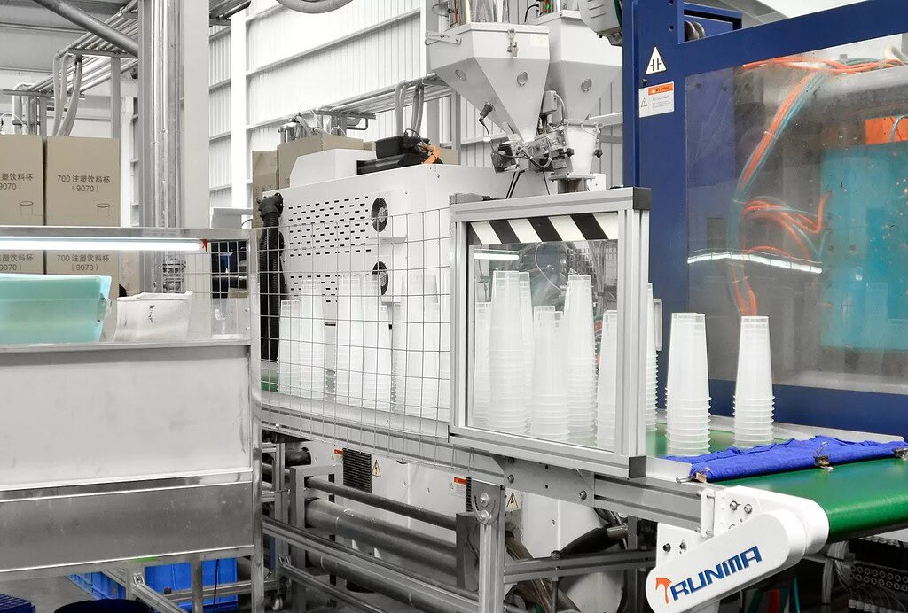 Automated bottle manufacturing machinery for glass and plastic containers.